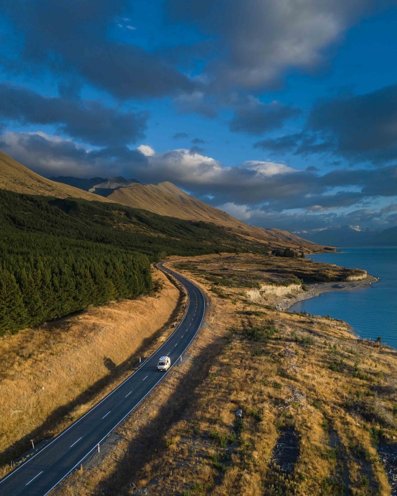 Road winding along a stunning coastal waterway